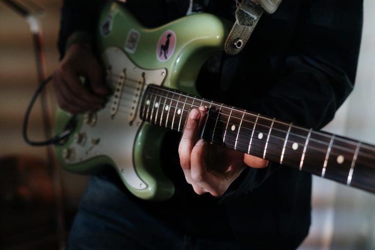 Stratocaster electric guitar and the best electric guitar strings in this article