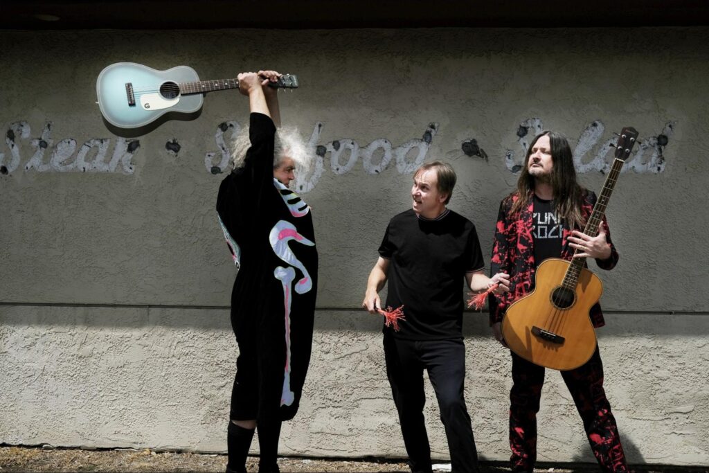Ein Bild der Band The Melvins im Street-Look